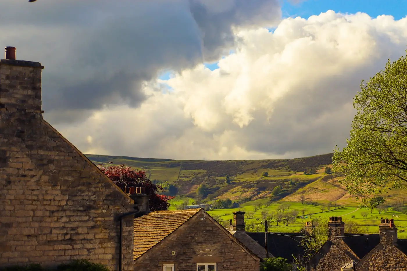 Yorkshire stone barn under a dramatic sky